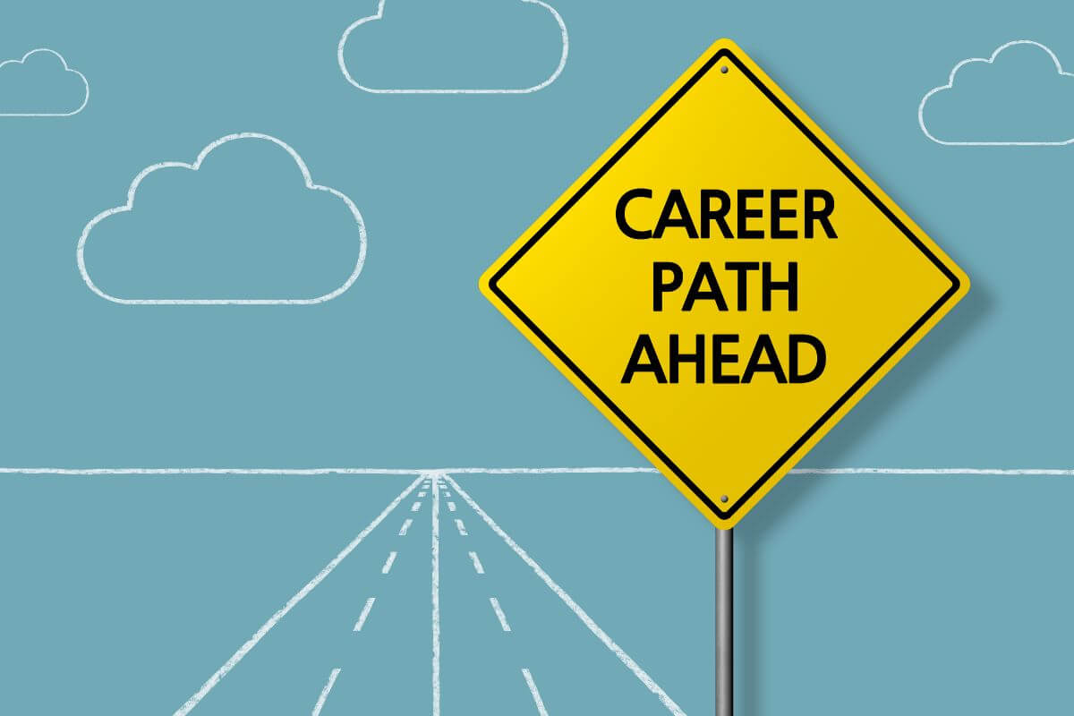 a yellow road sign saying CAREER PATH AHEAD